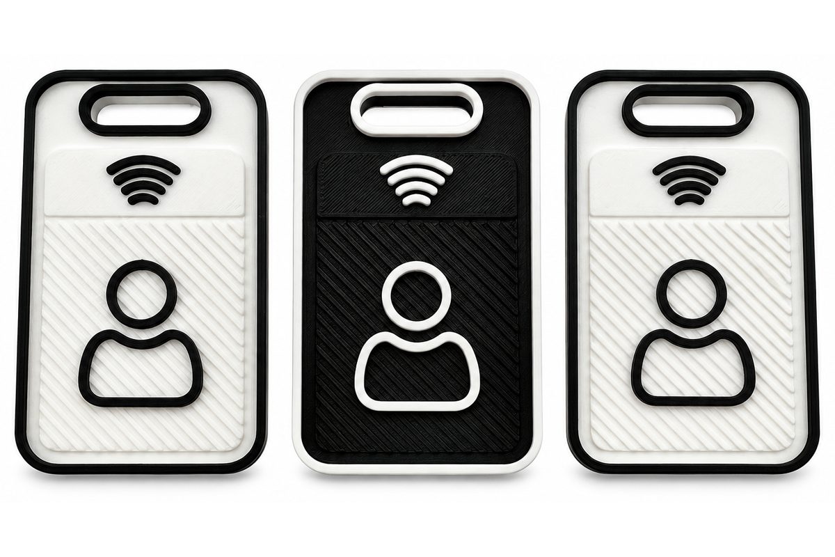 Three two-tone NFC contact fobs: white with black trim, black with white trim, and white with black trim
